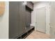 Mudroom with gray custom cabinets, bench seating and storage, offering a practical and organized transition space at 3006 Skyland Ne Dr, Brookhaven, GA 30319