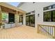 Covered porch with a dark fireplace, a comfortable seating area and a view of the backyard at 3006 Skyland Ne Dr, Brookhaven, GA 30319