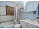Bathroom featuring a shower/tub and a toilet and a vanity sink at 34 Duke Dr, Lawrenceville, GA 30046