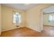 Empty bedroom featuring yellow walls and a ceiling fan at 34 Duke Dr, Lawrenceville, GA 30046