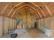 Spacious unfinished storage room with wood paneling, offering endless potential at 34 Duke Dr, Lawrenceville, GA 30046