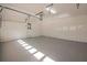 This large two car garage has painted floors and walls and an automatic door opener at 574 Oak Grove Rd, Temple, GA 30179
