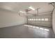This large two car garage has painted floors and walls and an automatic door opener at 574 Oak Grove Rd, Temple, GA 30179