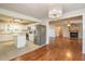 Modern kitchen with white cabinets, stainless steel appliances, and an island at 574 Oak Grove Rd, Temple, GA 30179