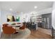 Modern kitchen and dining area with stainless steel appliances and stylish pendant lighting at 957 Sharon Se Cir, Smyrna, GA 30080
