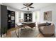 Home office featuring hardwood floors, built-in bookcases, and natural light at 957 Sharon Se Cir, Smyrna, GA 30080