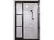 Modern shower featuring a glass door, black fixtures, white subway tile, and a patterned tile floor at 957 Sharon Se Cir, Smyrna, GA 30080