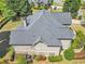 Aerial view of a home with a well-manicured yard, and a private backyard at 147 Gold Bridge Xing, Canton, GA 30114