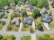 Wide aerial view showcasing the home nestled in a lush, green neighborhood at 147 Gold Bridge Xing, Canton, GA 30114