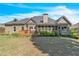 Spacious backyard with deck, screened-in porch and plenty of green space for outdoor enjoyment at 147 Gold Bridge Xing, Canton, GA 30114
