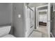 Bathroom with a shower, toilet and access to the bedroom at 147 Gold Bridge Xing, Canton, GA 30114
