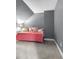 Bonus room showing neutral walls, unique architectural details and comfortable day bed, perfect for relaxation at 147 Gold Bridge Xing, Canton, GA 30114