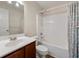 Bathroom featuring a single sink vanity and tub with shower at 2060 Ellison Nw Way # 11, Kennesaw, GA 30152
