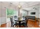 Inviting dining area with hardwood floors and access to the backyard at 2060 Ellison Nw Way # 11, Kennesaw, GA 30152
