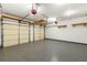 Spacious two car garage with epoxy floor, shelving, and two automatic garage doors at 2060 Ellison Nw Way # 11, Kennesaw, GA 30152