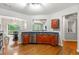 Open kitchen with granite countertops, stainless steel appliances, and hardwood floors at 2060 Ellison Nw Way # 11, Kennesaw, GA 30152
