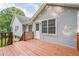 The exterior features a door to a wood deck and horizontal siding with a neutral tone at 2326 Westland Way, Acworth, GA 30102