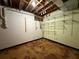 Unfinished basement with shelving, perfect for storage and organization with potential for customization at 2326 Westland Way, Acworth, GA 30102