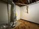 Basement with furnace and water heater, offering essential utilities in a functional space at 2326 Westland Way, Acworth, GA 30102