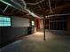 Unfinished basement with exposed ceiling, providing a blank canvas for customization and expansion at 2326 Westland Way, Acworth, GA 30102