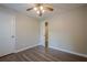 Bedroom featuring neutral paint, laminate flooring and a door at 2326 Westland Way, Acworth, GA 30102