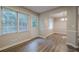 Dining room featuring hardwood floors, a back door, and natural light at 2326 Westland Way, Acworth, GA 30102
