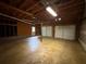 Spacious two-car garage featuring exposed ceiling, providing ample parking and storage at 2326 Westland Way, Acworth, GA 30102