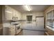 Traditional kitchen with tiled floors and white appliances at 2326 Westland Way, Acworth, GA 30102