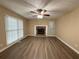 Spacious living room with a fireplace and hardwood floors at 2326 Westland Way, Acworth, GA 30102