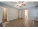 Spacious main bedroom with walk-in closet, tray ceiling and ceiling fan at 2326 Westland Way, Acworth, GA 30102