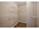 This is a roomy walk-in closet with wooden-look flooring and sturdy wire shelving at 2326 Westland Way, Acworth, GA 30102