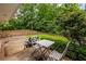 Charming back patio with seating area and grill, perfect for outdoor entertaining and relaxation at 4527 Sims Ct, Tucker, GA 30084