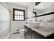 Bathroom with a vessel sink, dark wood vanity, and a glass-enclosed shower at 4527 Sims Ct, Tucker, GA 30084