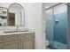 Updated bathroom with stylish vanity, modern fixtures, and a glass-enclosed shower at 4527 Sims Ct, Tucker, GA 30084