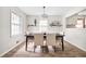 Bright dining room featuring hardwood floors, neutral paint, and natural light at 4527 Sims Ct, Tucker, GA 30084