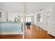 Spacious main bedroom with hardwood floors that seamlessly transitions into a functional kitchen area at 4527 Sims Ct, Tucker, GA 30084