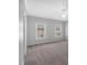 Spacious bedroom with carpet floors and plenty of natural light at 5407 Waters Edge Trl, Roswell, GA 30075