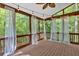 Outdoor patio with seating and decorative lighting providing an ambiance for relaxation at 5407 Waters Edge Trl, Roswell, GA 30075