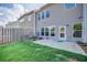 Backyard features a patio and privacy fence; perfect for outdoor entertaining at 1216 Foxcroft Ln, Cumming, GA 30041