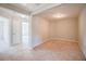 Neutral bedroom with carpet, recessed lights, and ample space for versatile use at 1216 Foxcroft Ln, Cumming, GA 30041