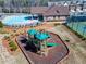 Community playground, pool, and tennis court offer fun activities for residents to enjoy in this neighborhood at 1216 Foxcroft Ln, Cumming, GA 30041