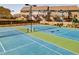 Community tennis courts and playground for active residents surrounded by beautiful townhome properties at 1216 Foxcroft Ln, Cumming, GA 30041