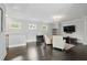 Inviting living room featuring hardwood floors and neutral paint at 1811 Kent Ave, Dunwoody, GA 30338