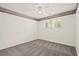 Carpeted bedroom with shuttered windows, ceiling fan, and horse themed border at 1880 Barrett Dr, Cumming, GA 30040