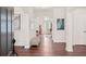 Inviting foyer with hardwood floors and open sight lines to the rest of the home at 1880 Barrett Dr, Cumming, GA 30040