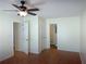 Bedroom featuring hardwood floors, a ceiling fan and an en-suite bathroom at 214 Sweetwater Cir, Powder Springs, GA 30127