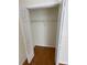 Spacious walk-in closet providing ample storage with shelving and rods at 214 Sweetwater Cir, Powder Springs, GA 30127