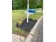 A blue mailbox sits in a newly mulched spot on the corner of the property at 214 Sweetwater Cir, Powder Springs, GA 30127