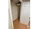 Bright, unfinished storage area with wood-look floors and ample shelving space at 214 Sweetwater Cir, Powder Springs, GA 30127