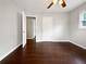 This is a bedroom featuring beautiful hardwood floors and white doors and trim at 3653 Mecklinburg Pl, Decatur, GA 30032